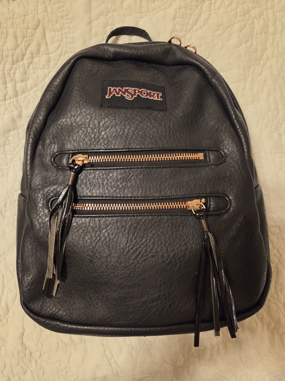 JanSport Half Pint 2 FX (Faux) Leather Mini Backpack With Rose Gold Hardware.